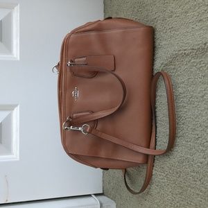 Brown medium sized Coach purse